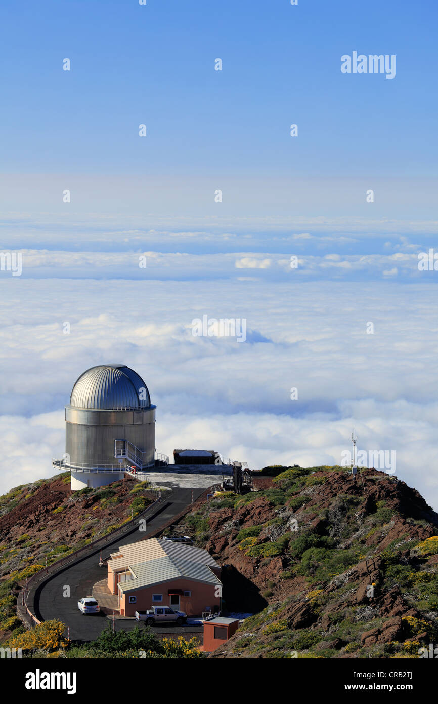 View over the cloud cover with Nordic Optical Telescope observatory, astronomical telescope, Roque de los Muchachos Observatory Stock Photo