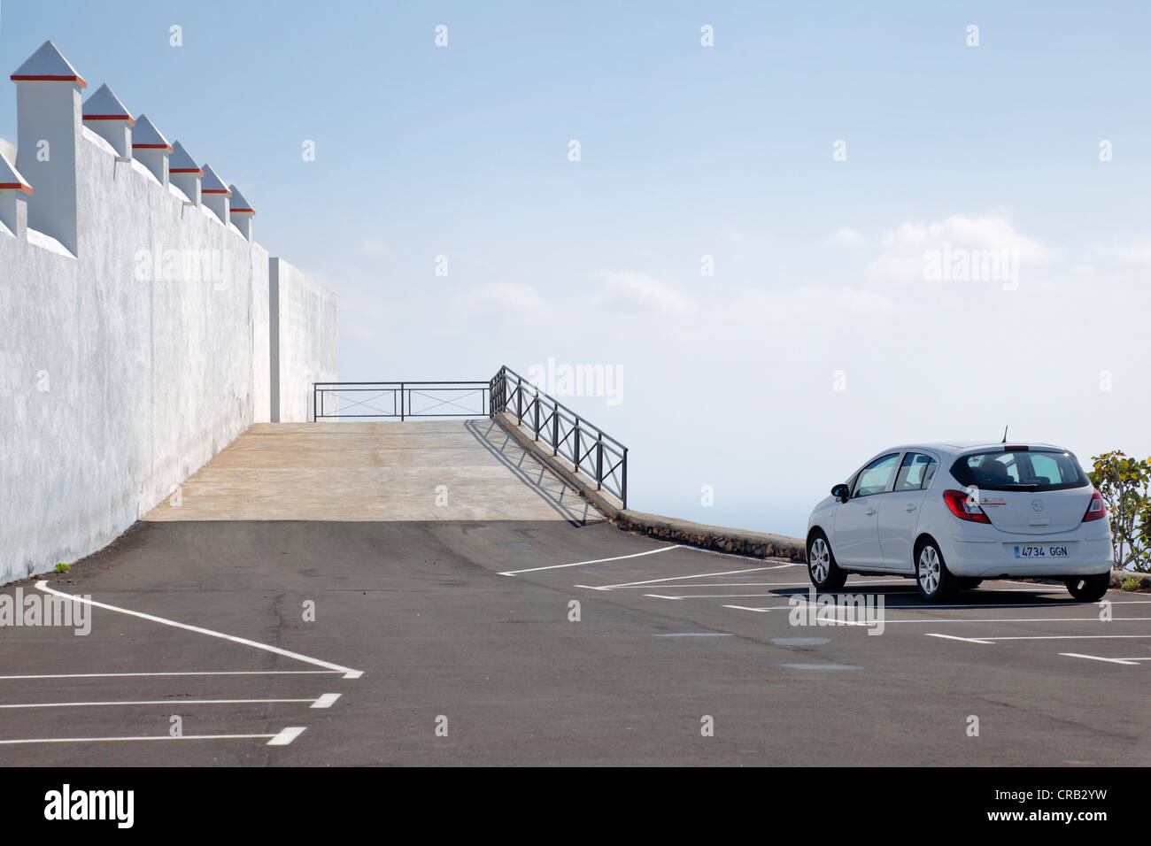 Car at a car park, cemetery wall, Santo Domingo de Garafia, La Palma