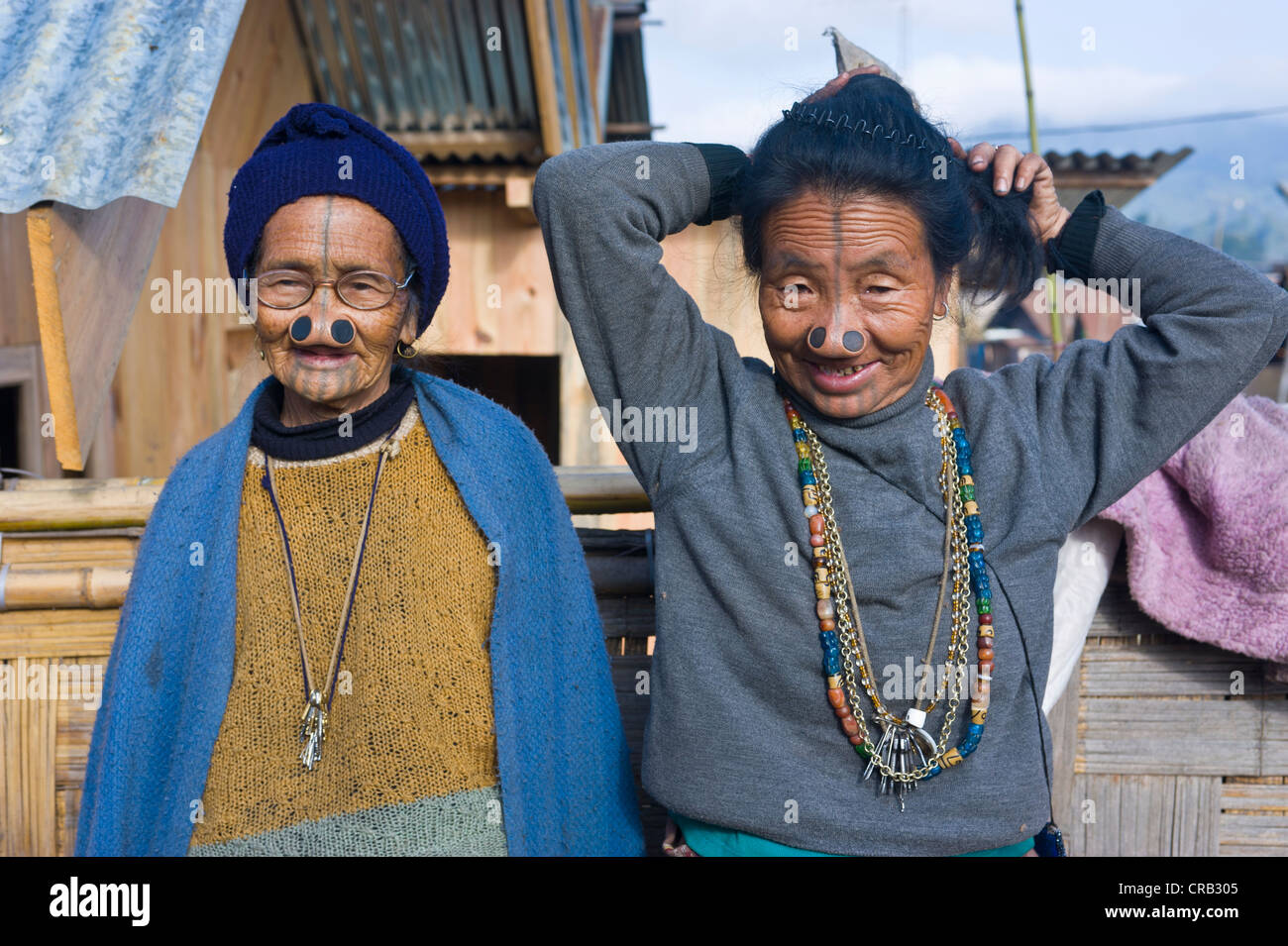 Old women from the Apatani tribe, known for the pieces of wood in their nose to make them ugly, Ziro, Arunachal Pradesh Stock Photo
