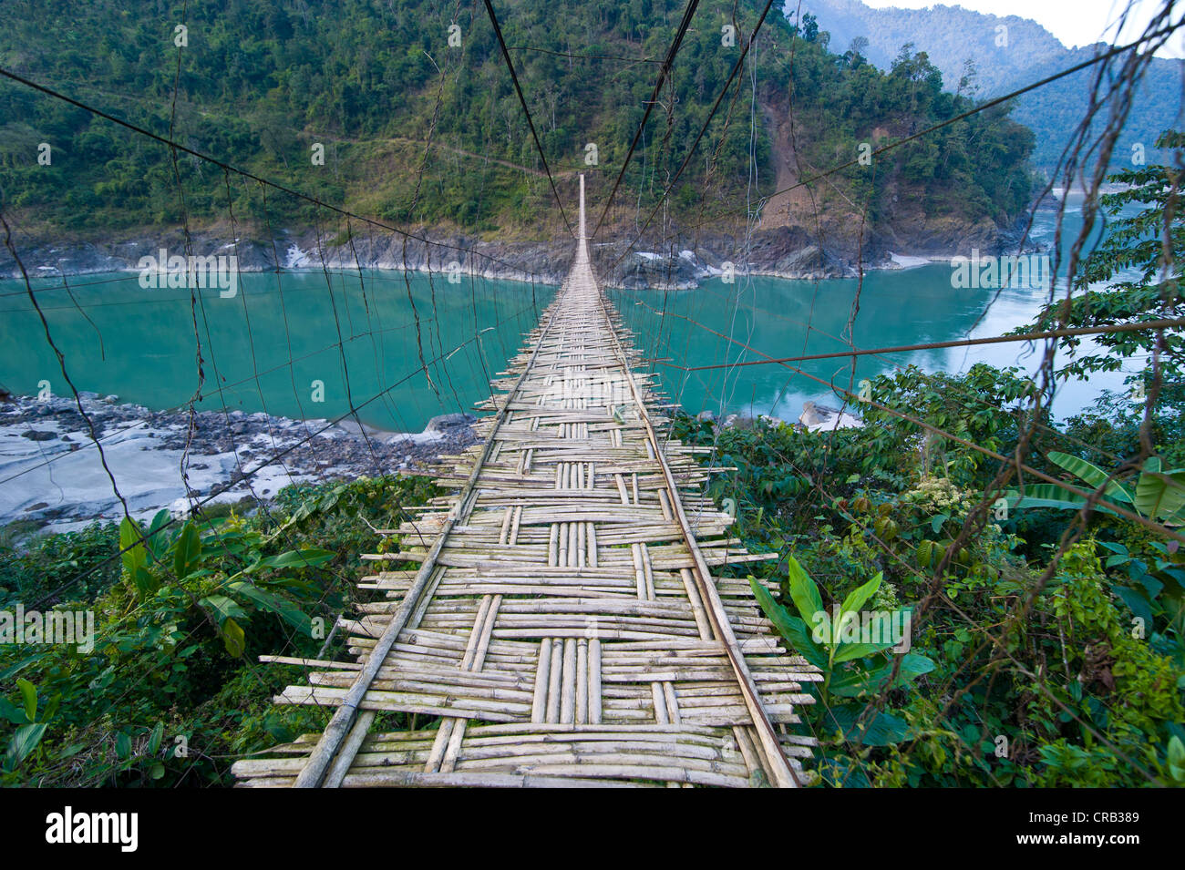 Long suspension bridge made of palm wood spanning the Siang River, Arunachal Pradesh, North East India, India, Asia Stock Photo