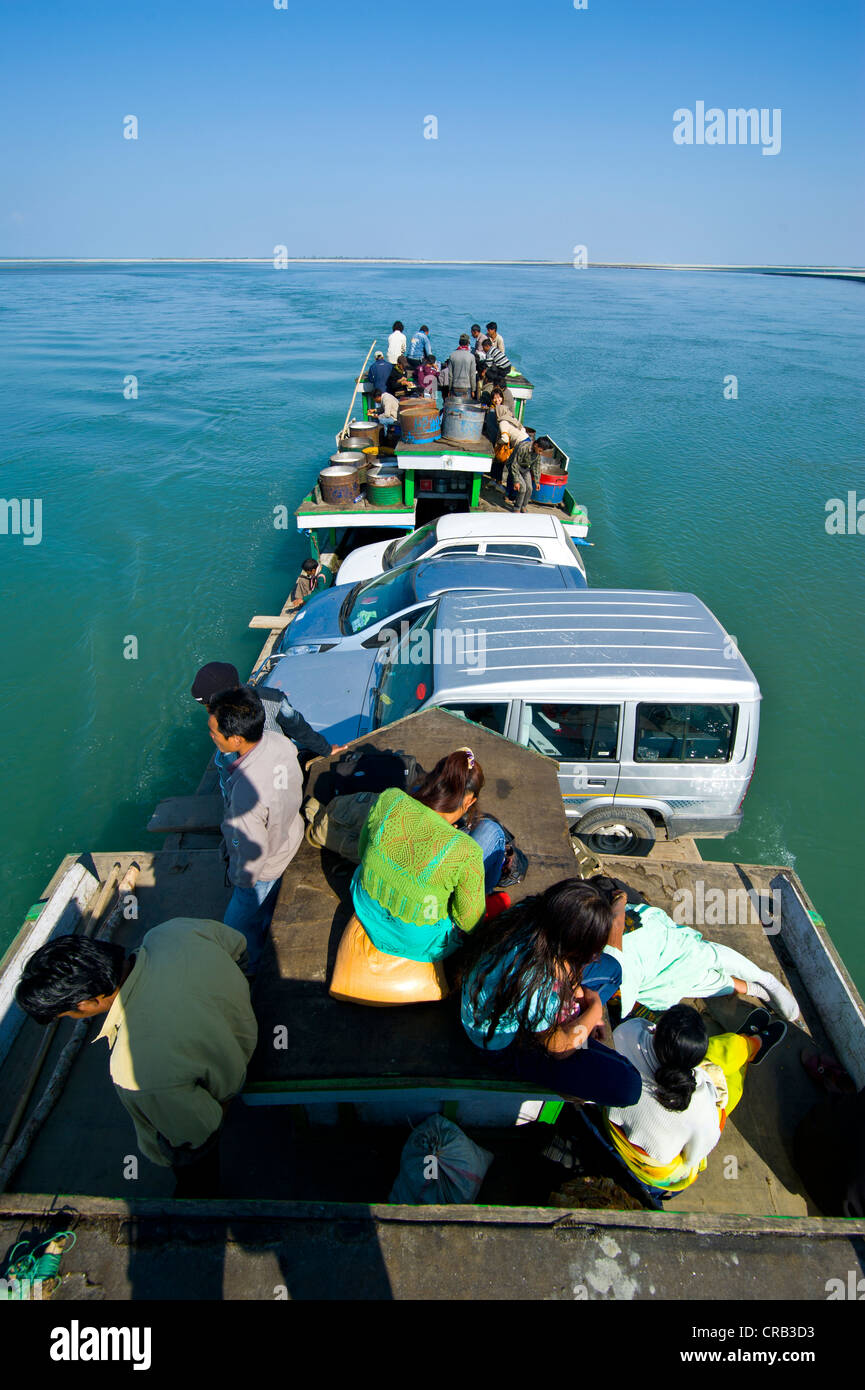 Ferry loaded with people and cars, on the Brahmaputra River, Assam, North East India, India, Asia Stock Photo