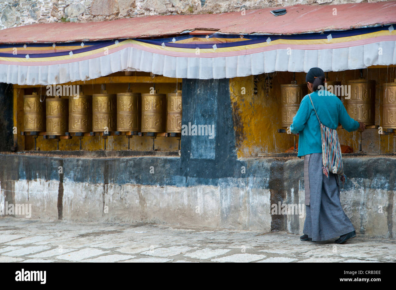 Elderly pilgrim in Drepung Temple, Lhasa, Tibet, Asia Stock Photo