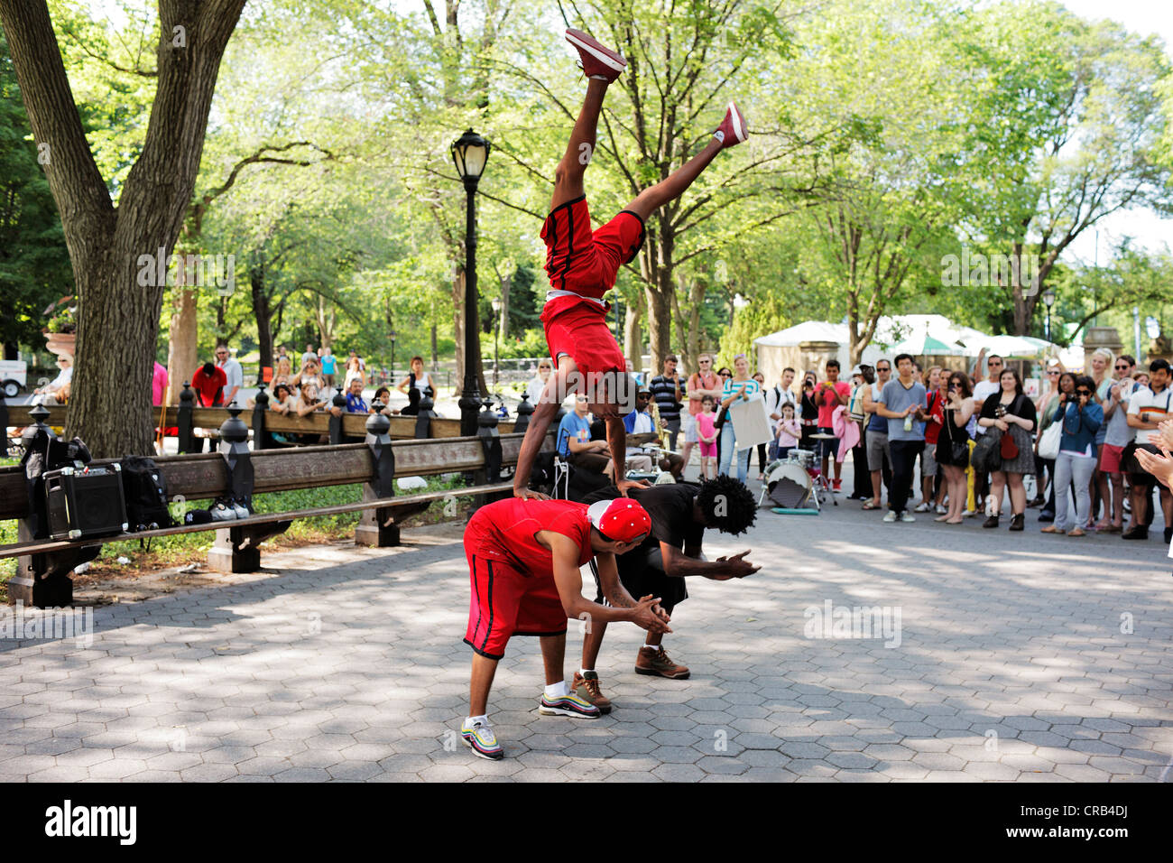NEW YORK CITY, USA - JUNE 14: Street artist team "Afrobats" performing in Central Park. June 14, 2012 in New York City, USA Stock Photo