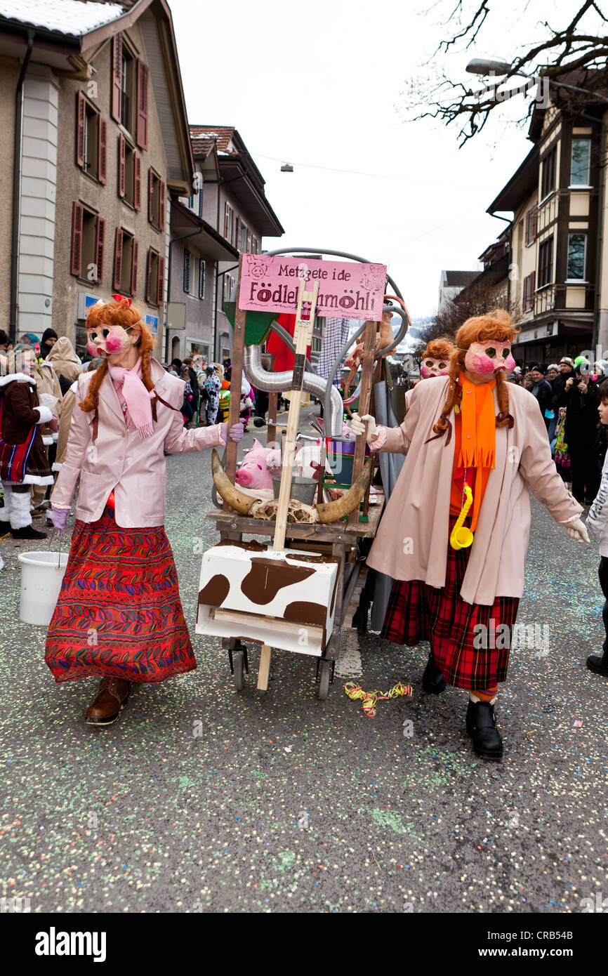Pigs, costumes, freshly slaughtered pigs, 35th Motteri-Umzug parade in Malters, Lucerne, Switzerland, Europe Stock Photo