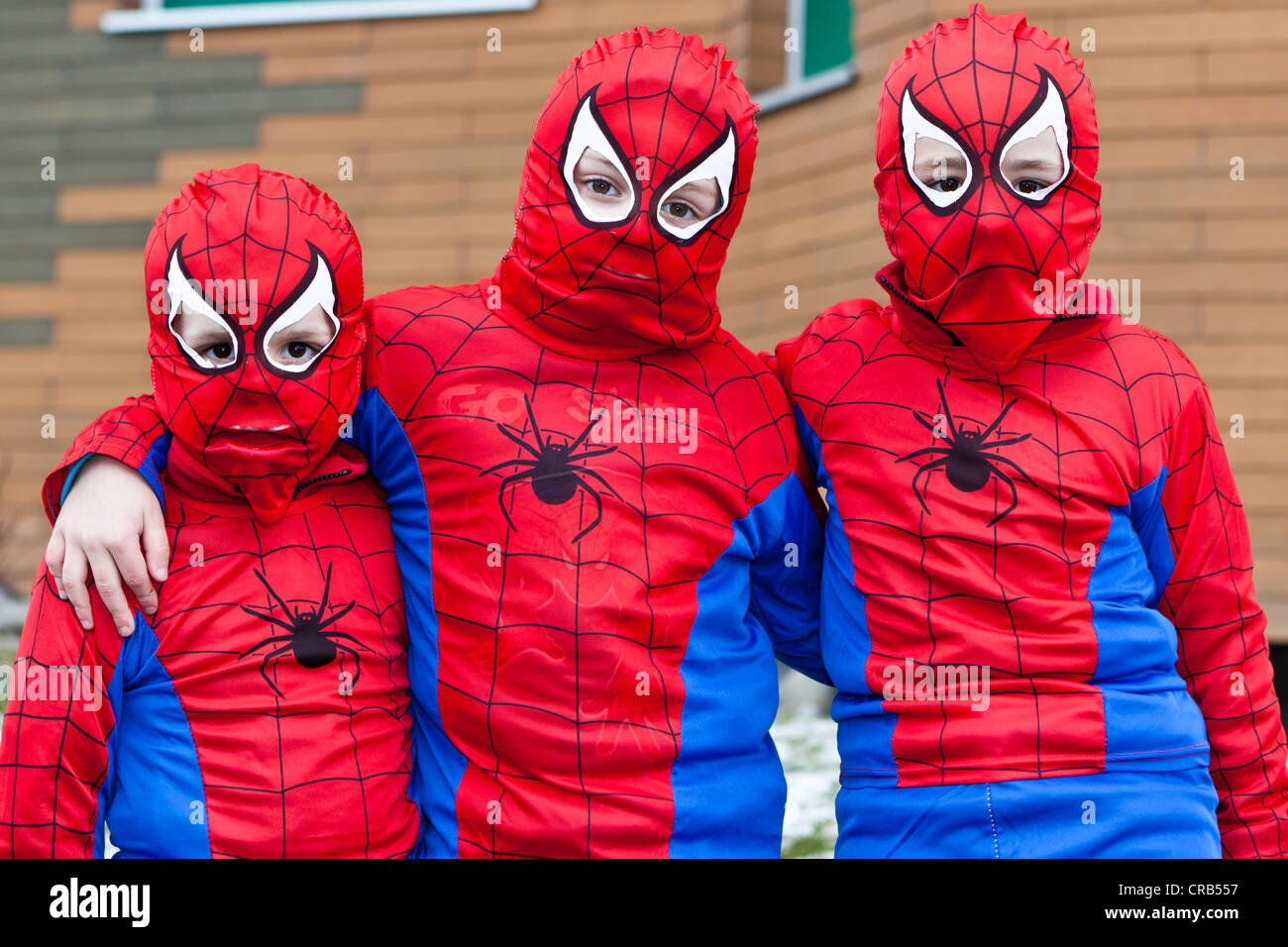 Three children dressed up as Spidermen, 35th Motteri-Umzug parade in Malters, Lucerne, Switzerland, Europe Stock Photo