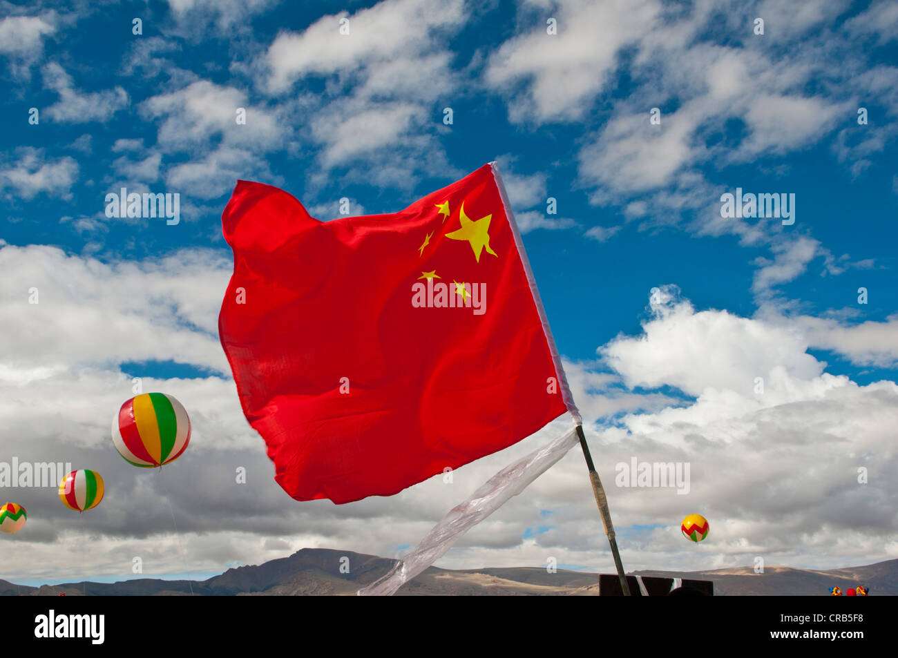 Flag of the People's Republic of China during the traditional festival of the tribes in Gerze, Western Tibet, Asia Stock Photo