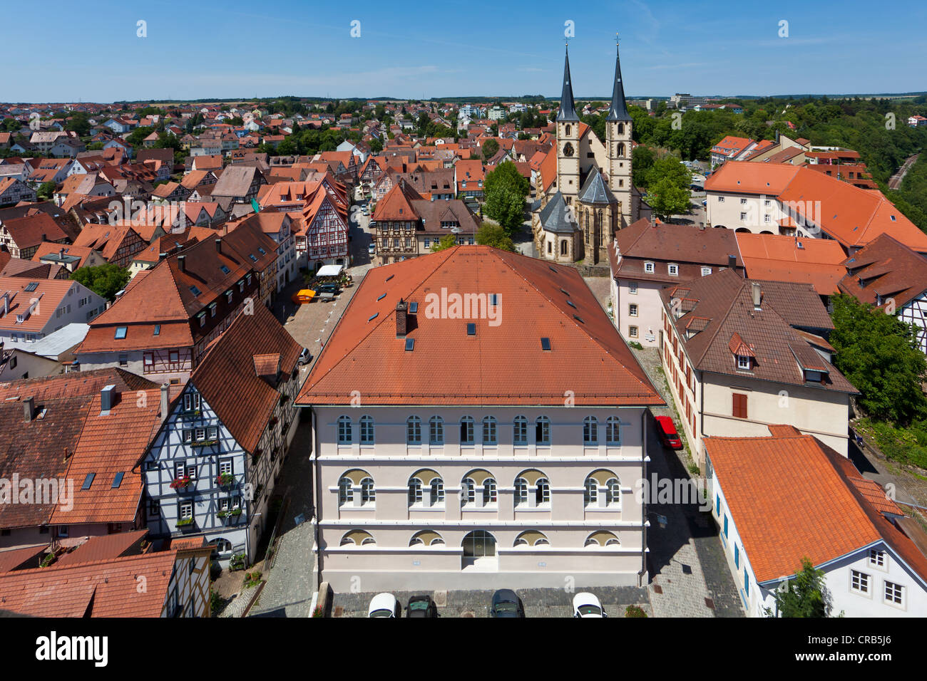 Franconian half-timbered buildings with the Collegiate Church of St. Peter, historic town centre of Bad Wimpfen, Neckartal Stock Photo