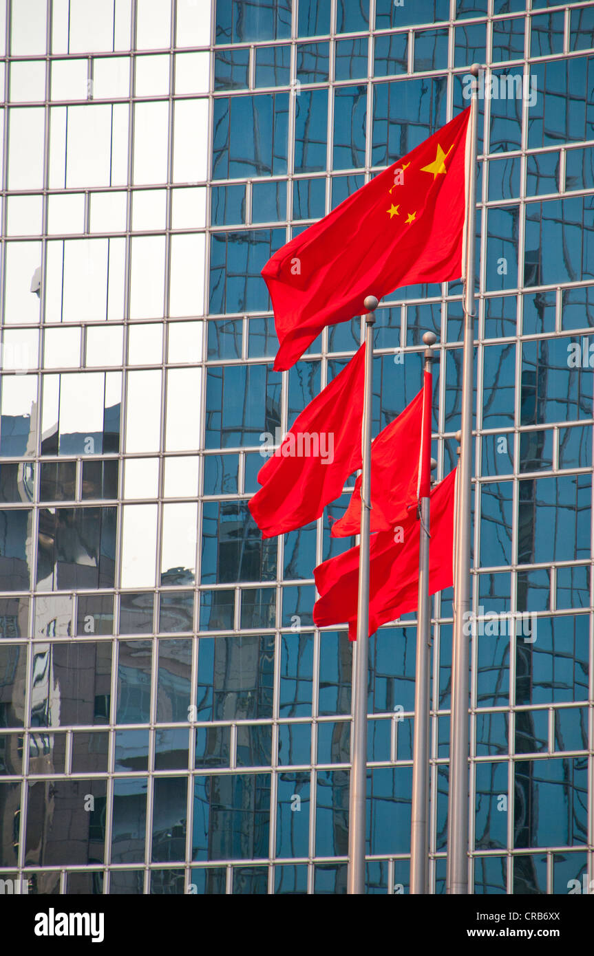 Chinese national flags in front of an office building in Beijing, China, Asia Stock Photo