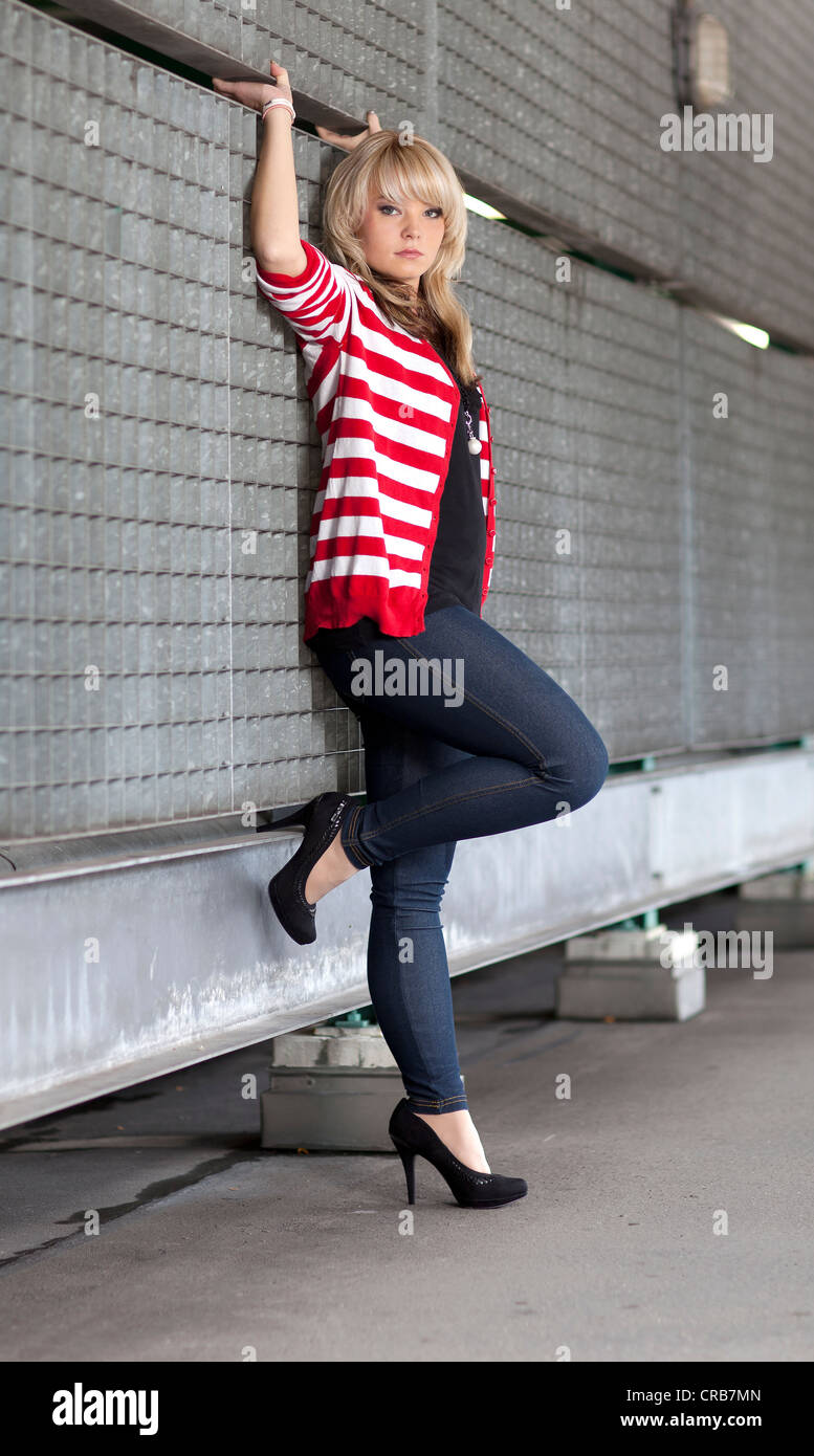 Blonde woman wearing long cardigan hi-res stock photography and images -  Alamy