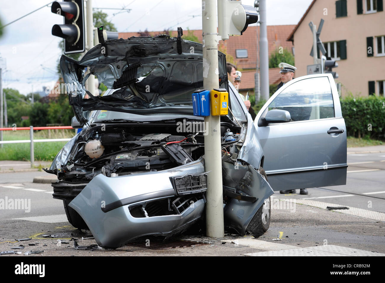 Road traffic accident of a Skoda car hitting traffic lights at a pedestrian crossing, Stuttgart, Baden-Wuerttemberg Stock Photo