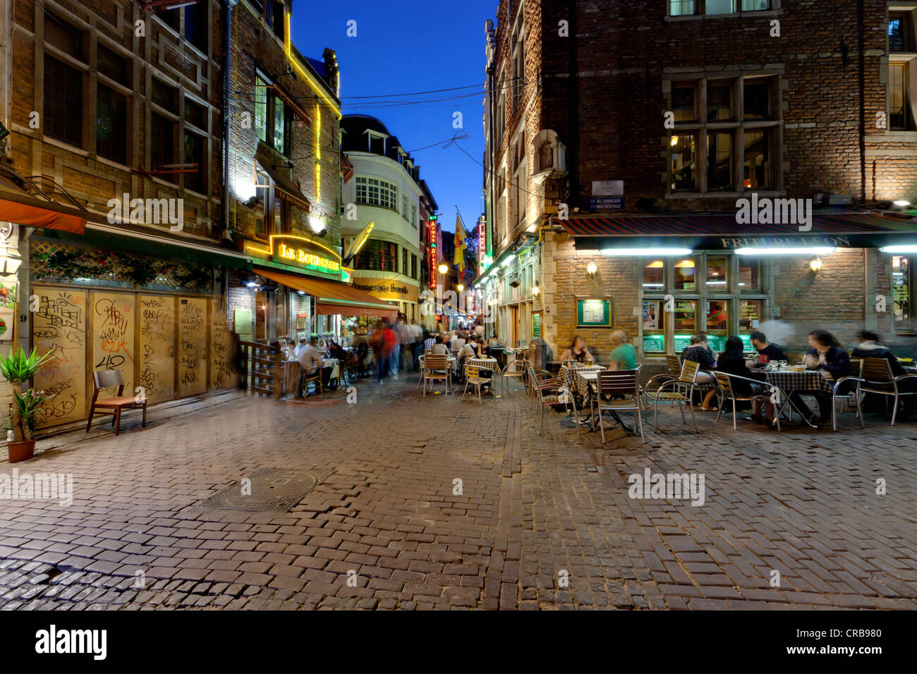 Street restaurants in the historic centre at night, Beenhouwersstraat, Brussels, Belgium, Europe Stock Photo