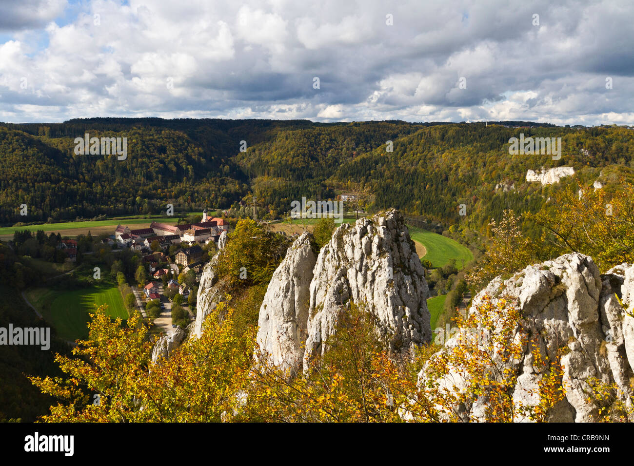 View of the Petersfels rock formation and Kloster Beuron monastery, upper Danube valley, Landkreis Sigmaringen district Stock Photo