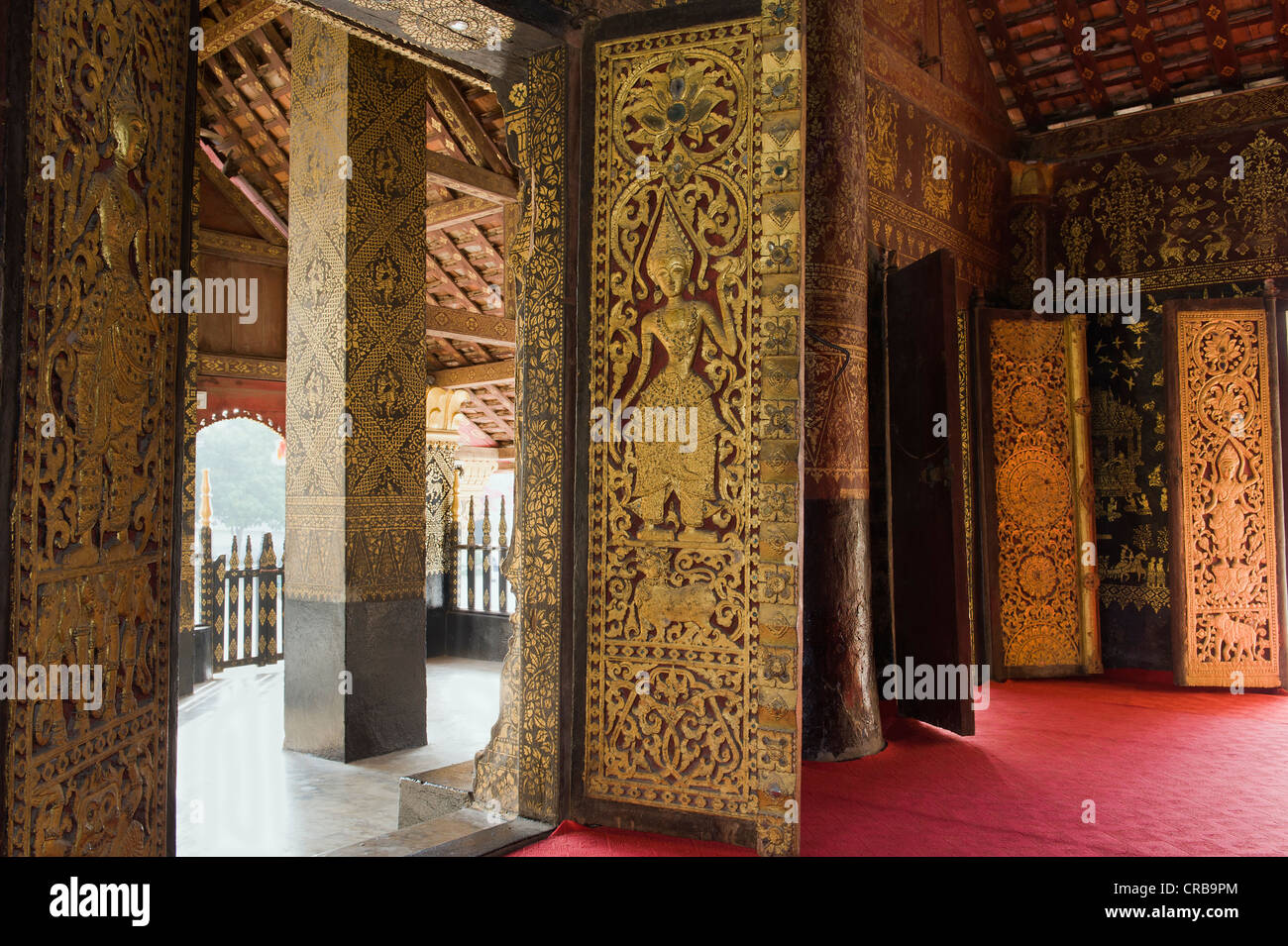 Entrance door ornamented with gold reliefs, Wat Xieng Thong temple, Luang Prabang, Laos, Indochina, Asia Stock Photo