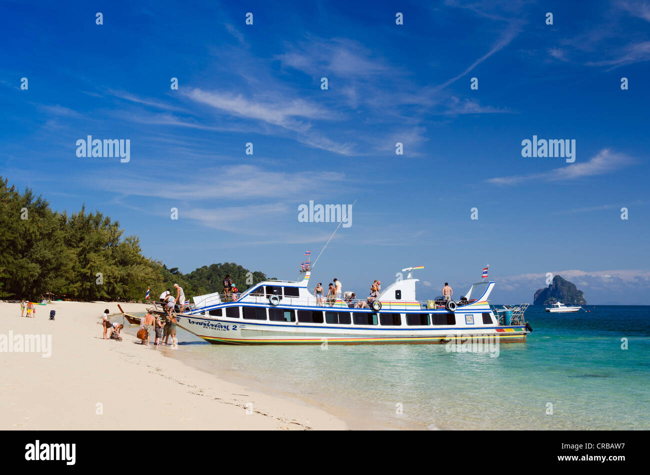 Tourists embarking a ferry, sandy beach, Koh Kradan island, Trang province, Thailand, Southeast Asia, Asia Stock Photo