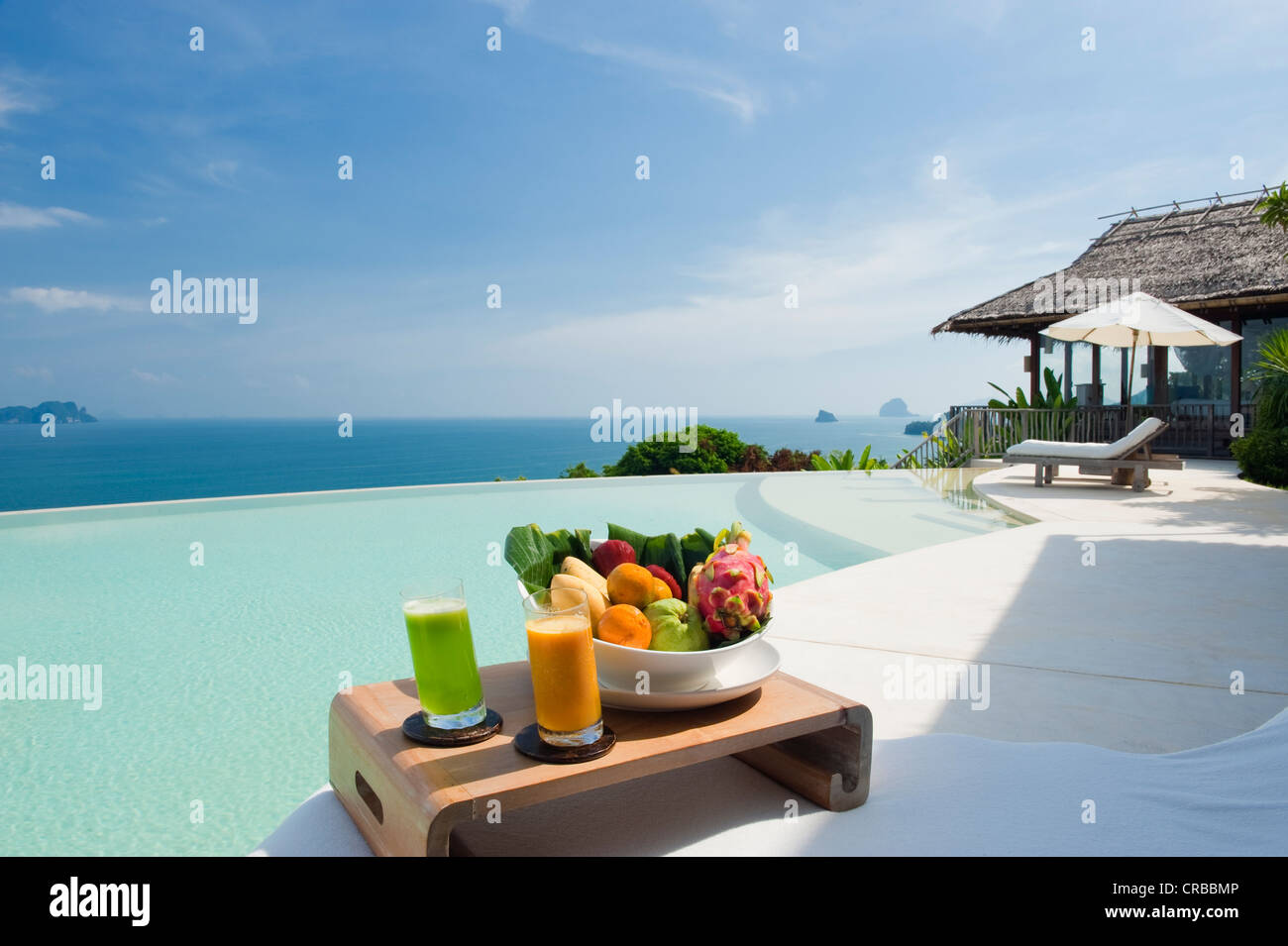 Fruit and drinks at the pool, luxury hotel, Six Senses Resort, Koh Yao Noi island, Phang Nga, Thailand, Southeast Asia, Asia Stock Photo