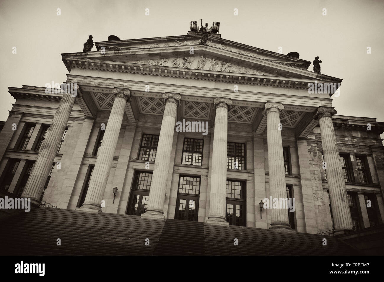 Black-and-white-shot, sepia, front facade of the Konzerthaus building, Schinkel building, Gendarmenmarkt, Bezirk Mitte, Berlin Stock Photo
