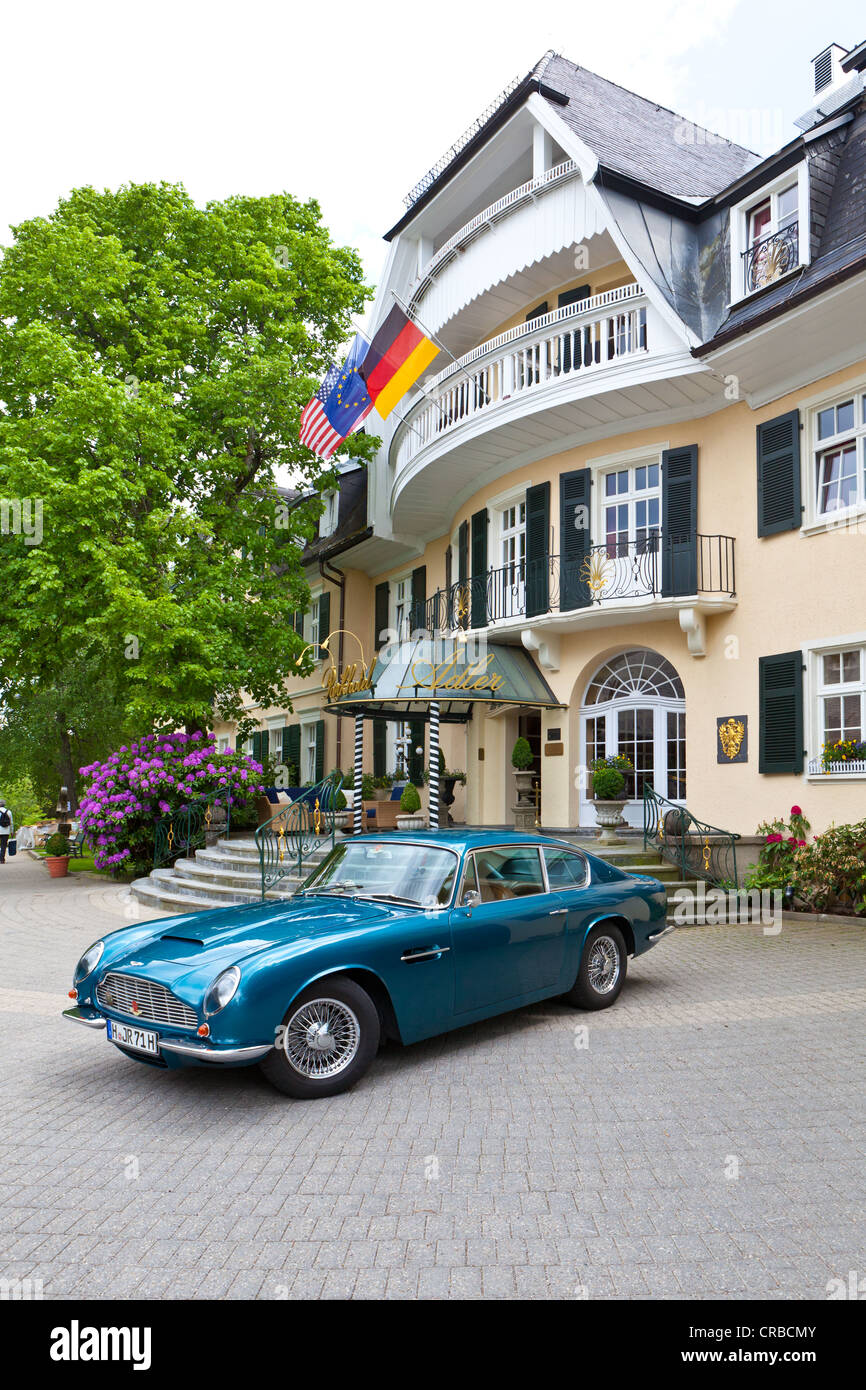 Aston Martin DB6 parked in front of Parkhotel Adler, luxury hotel, Hinterzarten, Baden-Wuerttemberg, Germany, Europe Stock Photo