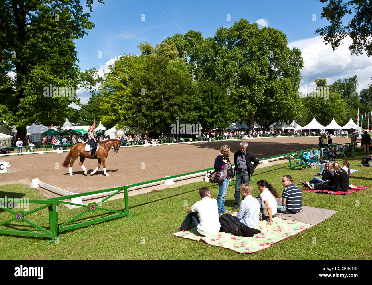 Spectators at the International Pentecostal show jumping and dressage competition, Schlosspark Biebrich palace gardens Stock Photo