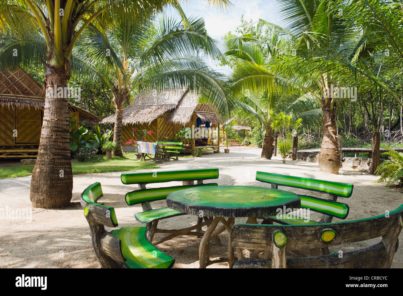 Bungalows between palm trees, Banana Bungalow Hotel, Ao Tha Len, Krabi