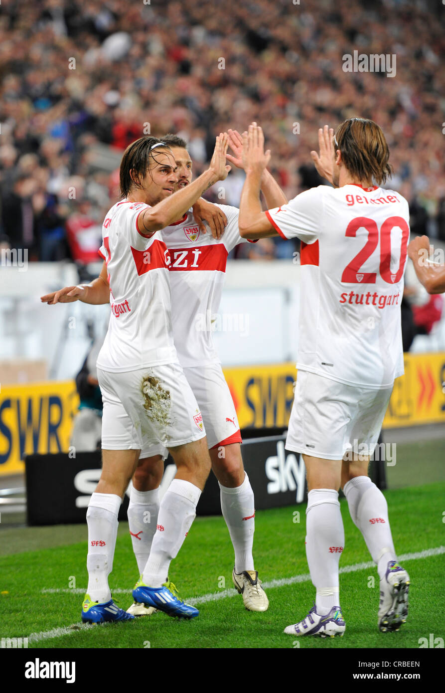 Goal scorer Martin Harnik, VfB Stuttgart, left, celebrating his goal with his team colleagues Zdravo Kuzmanovic, middle Stock Photo
