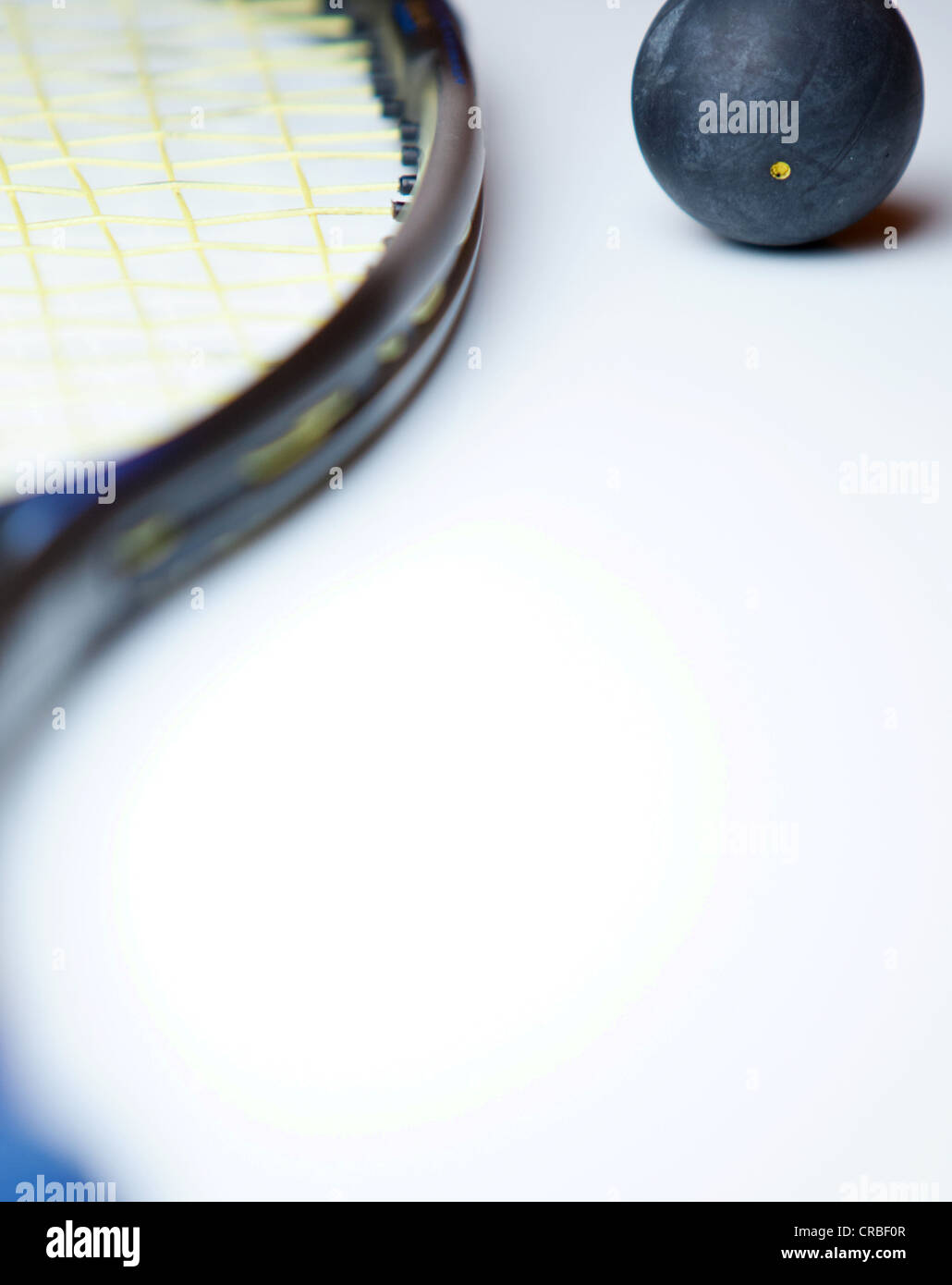 squash ball and a squash racket on white background Stock Photo Alamy