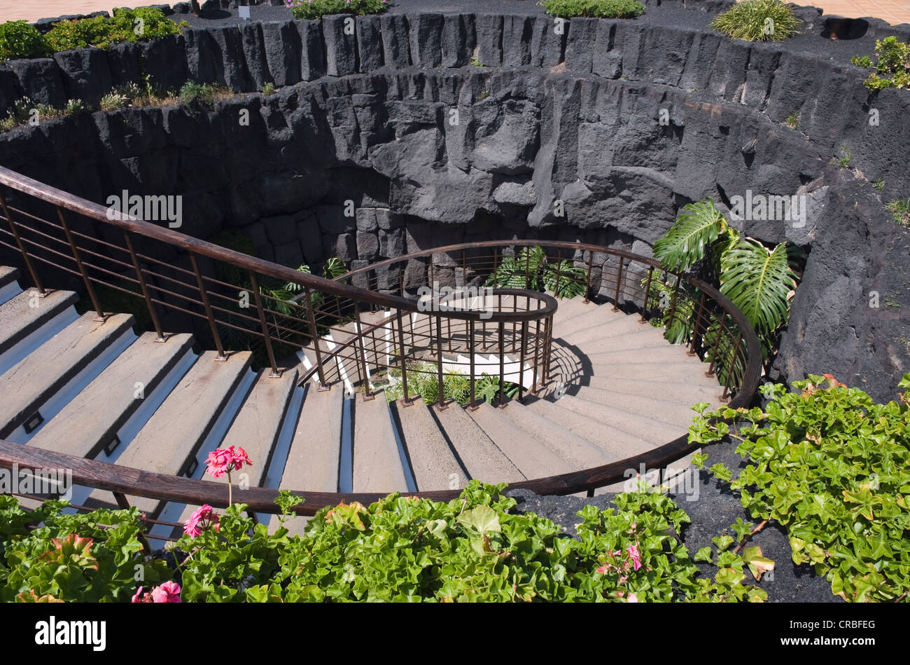 Spiral staircase leading downward into a lava cave, Casa Museo del Campesino farm museum, Mozaga, , Spain, Europe Stock Photo