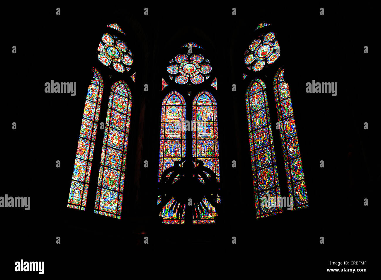Historical stained glass windows, Chapelle absidiale de Sainte Therese, side chapel, Notre-Dame Cathedral Stock Photo
