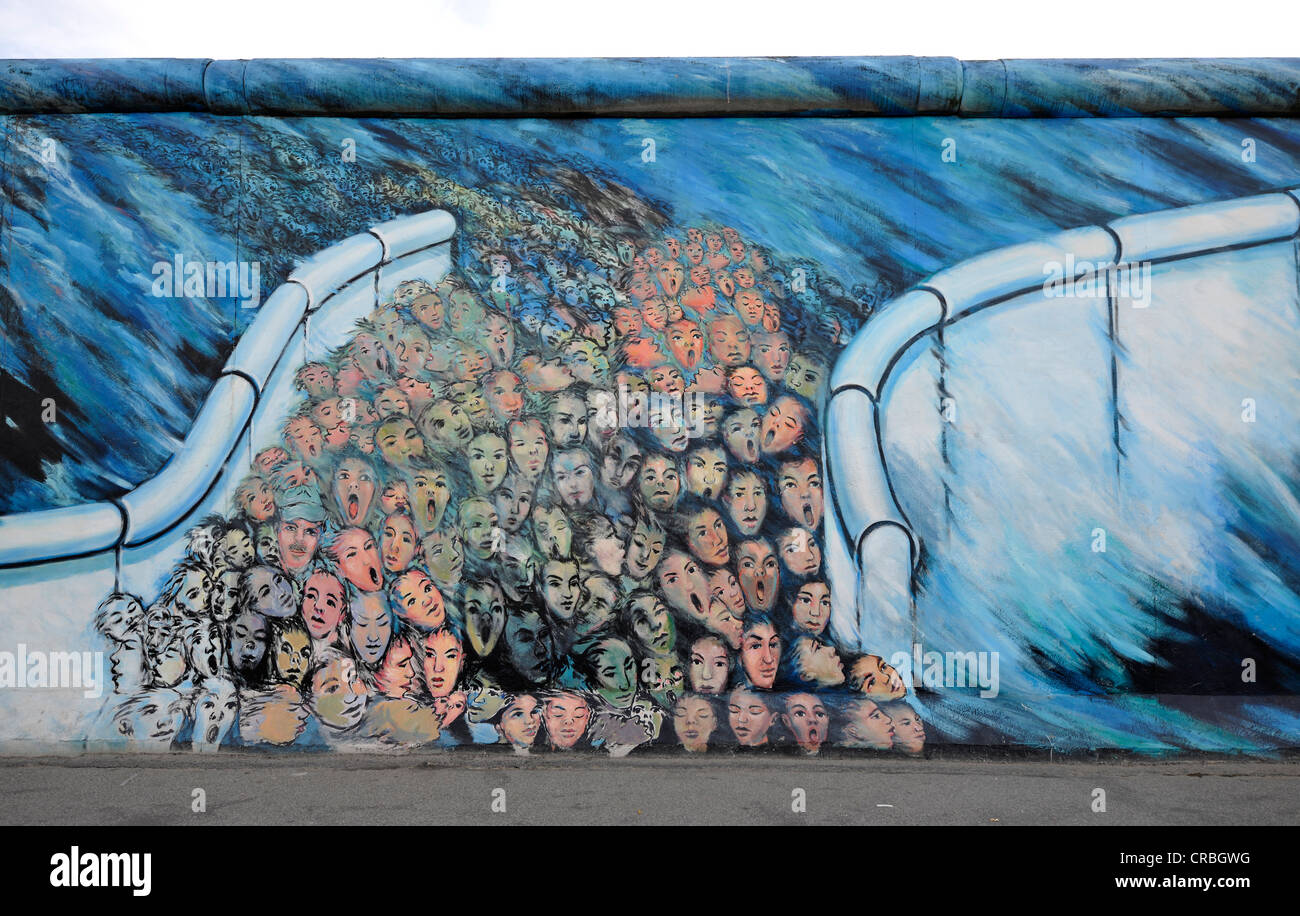 Art berlin wall breaking through hi-res stock photography