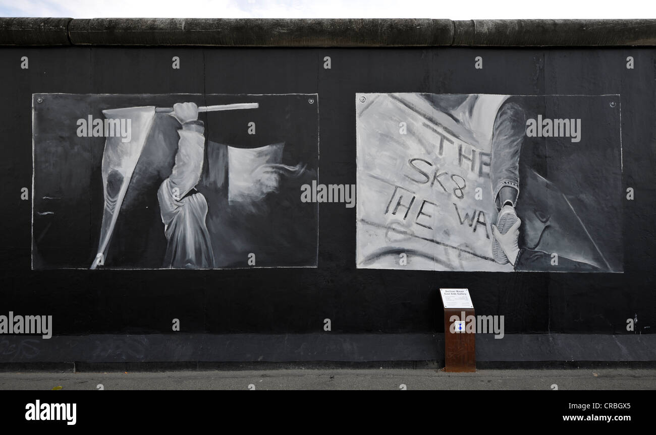 Art and the Berlin Wall, painting on a remaining segment of the Berlin Wall, East Side Gallery, Friedrichshain-Kreuzberg, Berlin Stock Photo