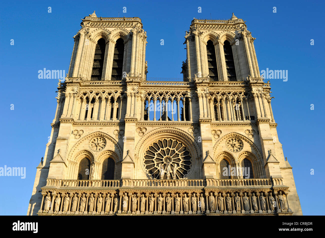 West facade, Gothic ornamental figures over the main portal, rose window, Cathedral of Notre-Dame de Paris, Ile de la Cité Stock Photo