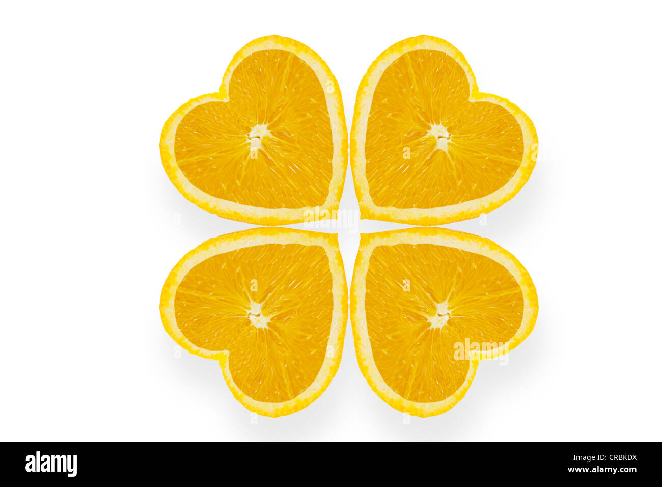 Oranges, heart-shaped, arranged as a cloverleaf Stock Photo