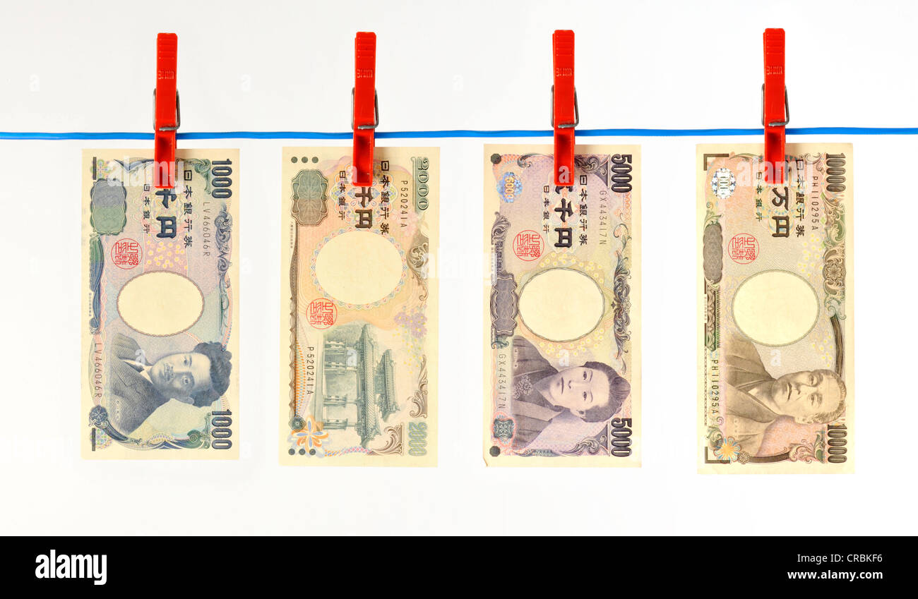 Japanese yen bank notes, bills on a clothesline, symbolic image for money laundering, dirty money Stock Photo