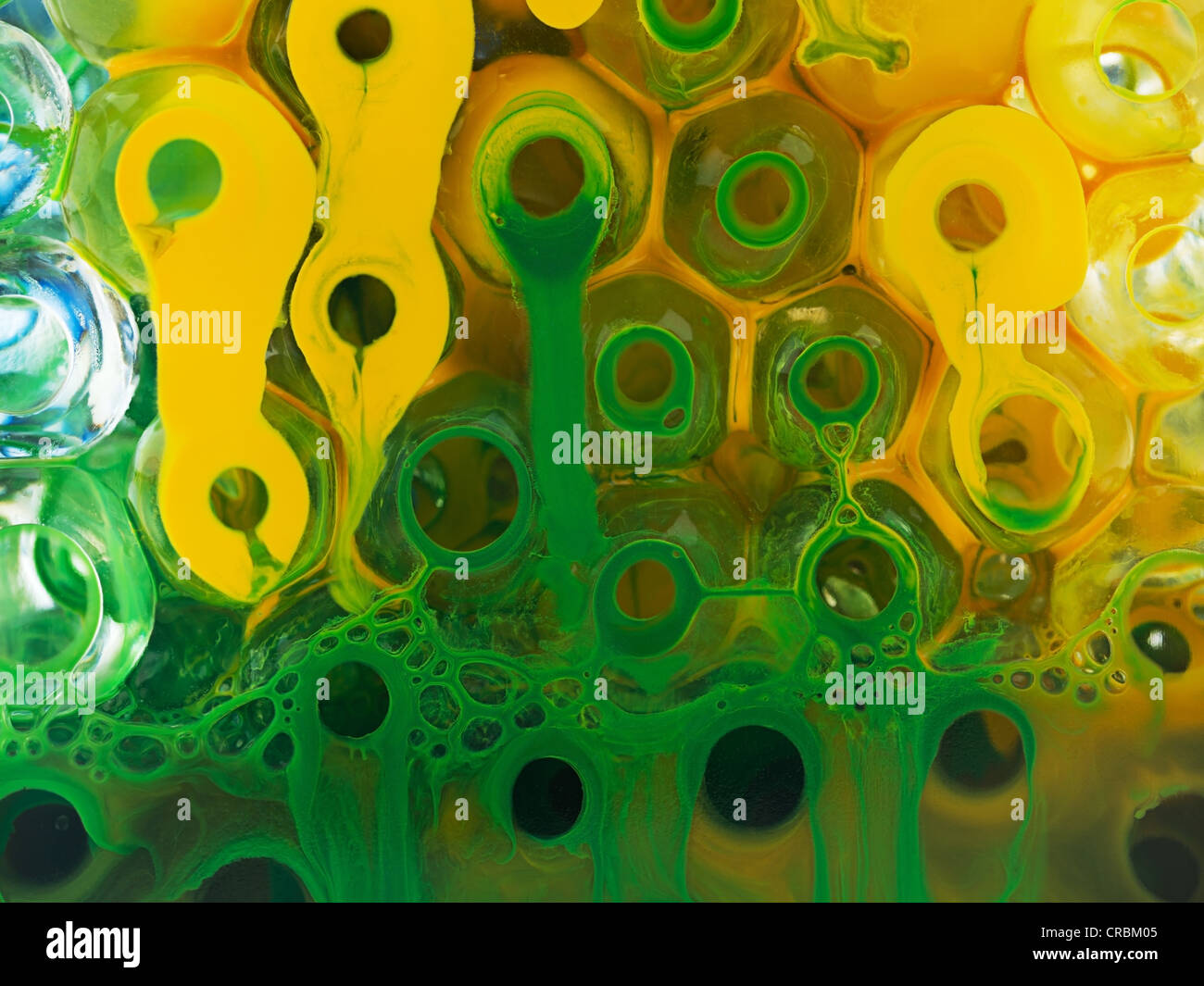 ball transparent liquid with yellow pigment and green Stock Photo Alamy