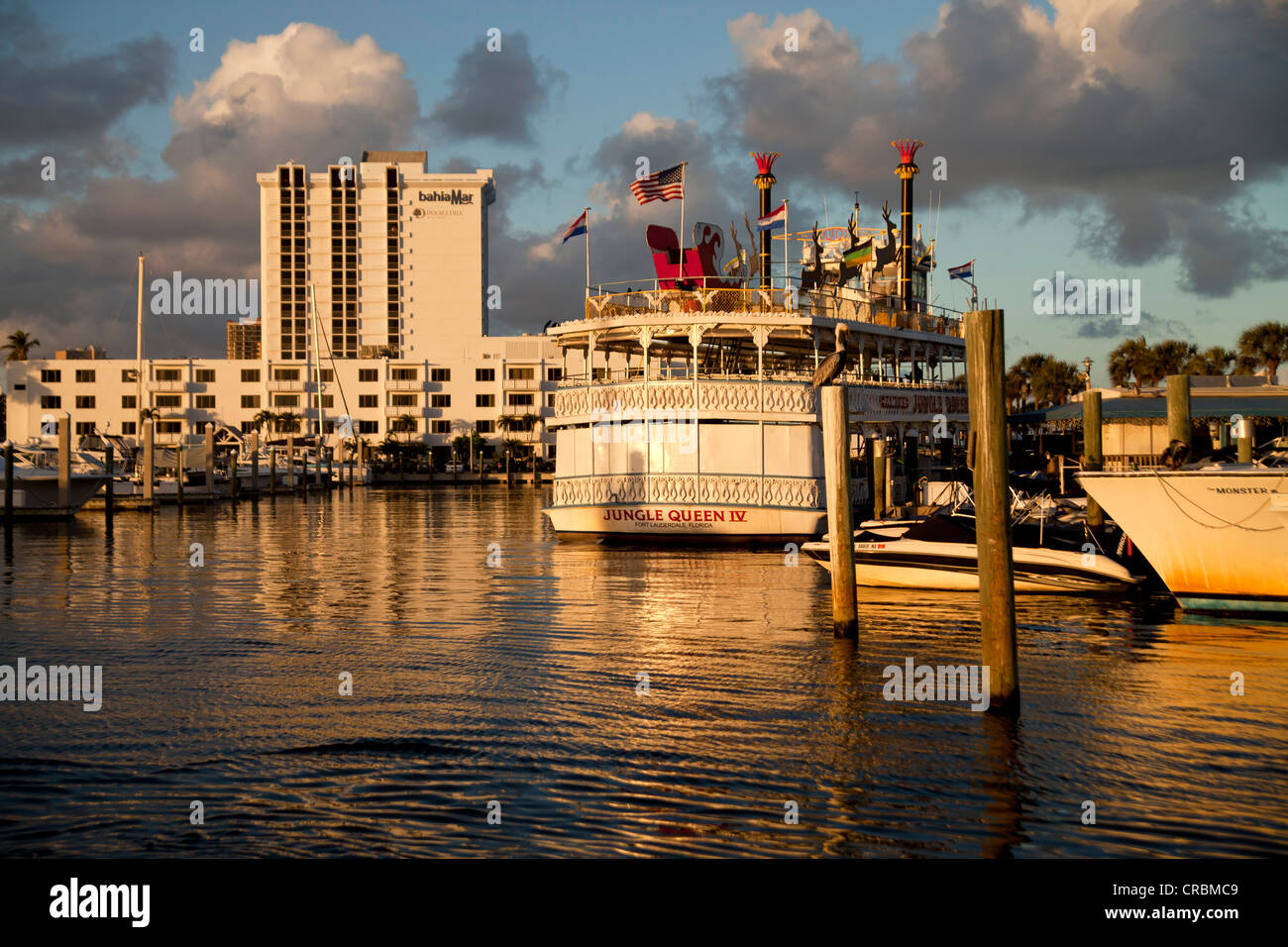 Excursion boat and Jungle Queen riverboat in the marina of Fort