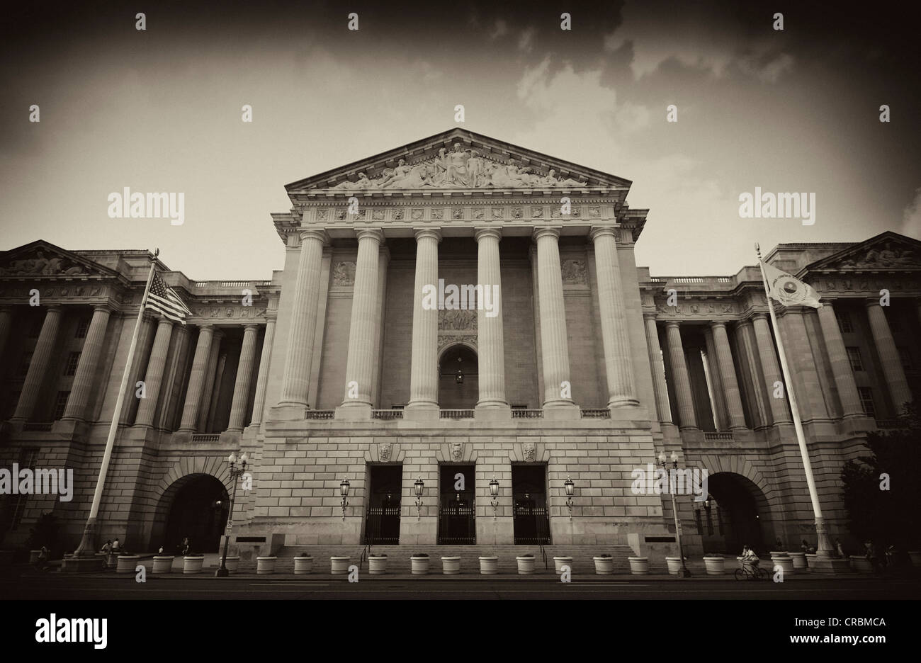 Black and white image, sepia, neoclassical facade of the Andrew Mellon Auditorium, former Departmental Auditorium, National Mall Stock Photo