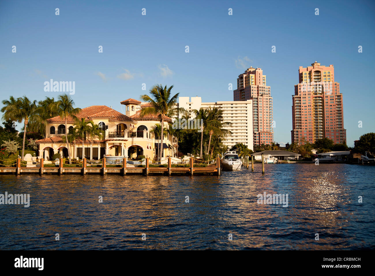 Apartment buildings and luxury villas on the waterfront in the town