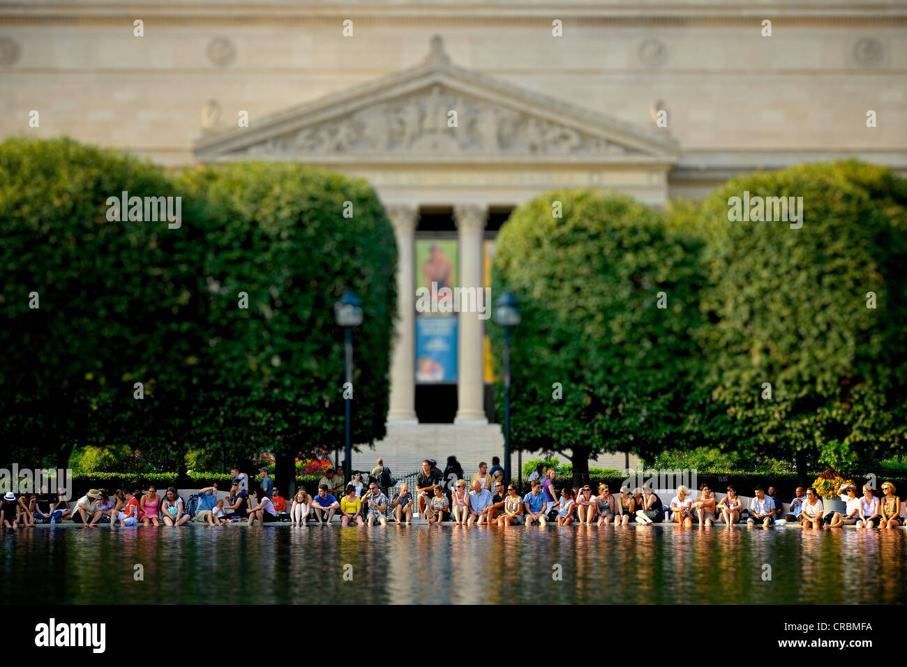 Miniature view, toy view, tilt-shift-effect, people relaxing at the lake of the National Gallery of Art Sculpture Garden Museum, Stock Photo