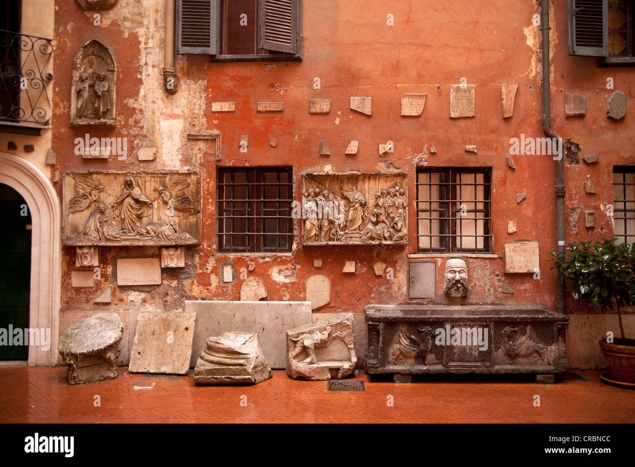 Roman remains in a courtyard, Rome, Lazio, Italy, Europe Stock Photo