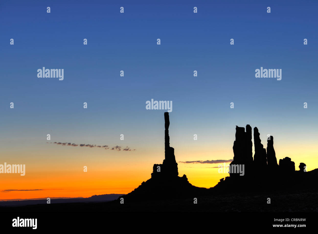 Totem Pole and Yei Bi Chei rock formations before sunrise, dawn