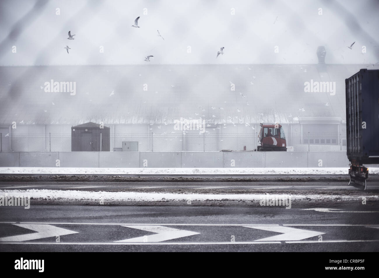 Snowing Container Port Containers in snowy harbor Stock Photo - Alamy