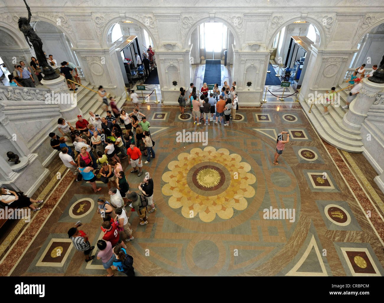 Tourists in the magnificent entrance hall with signs of the zodiac, The Great Hall, The Jefferson Building, Library of Congress Stock Photo