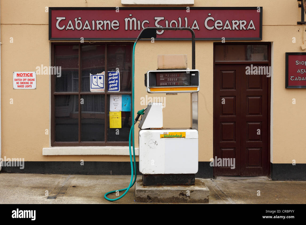 Petrol station and pub, with Gaelic lettering, Kilcar, County Donegal, Ireland, Europe, PublicGround Stock Photo