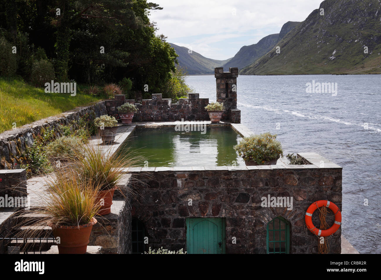 Pool and boathouse on Lough Veagh, Glenveagh Castle and Gardens, Glenveagh National Park, County Donegal, Ireland, Europe Stock Photo