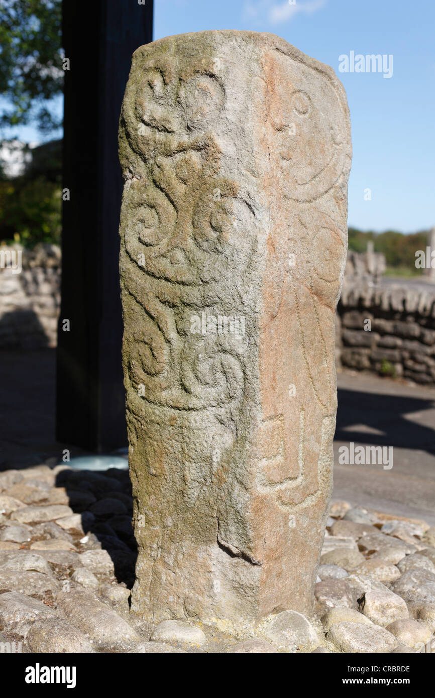 Stone pillar with a relief of Goliath with a sword on the Donagh Cross, Carndonagh, Inishowen Peninsula, County , Ireland Stock Photo