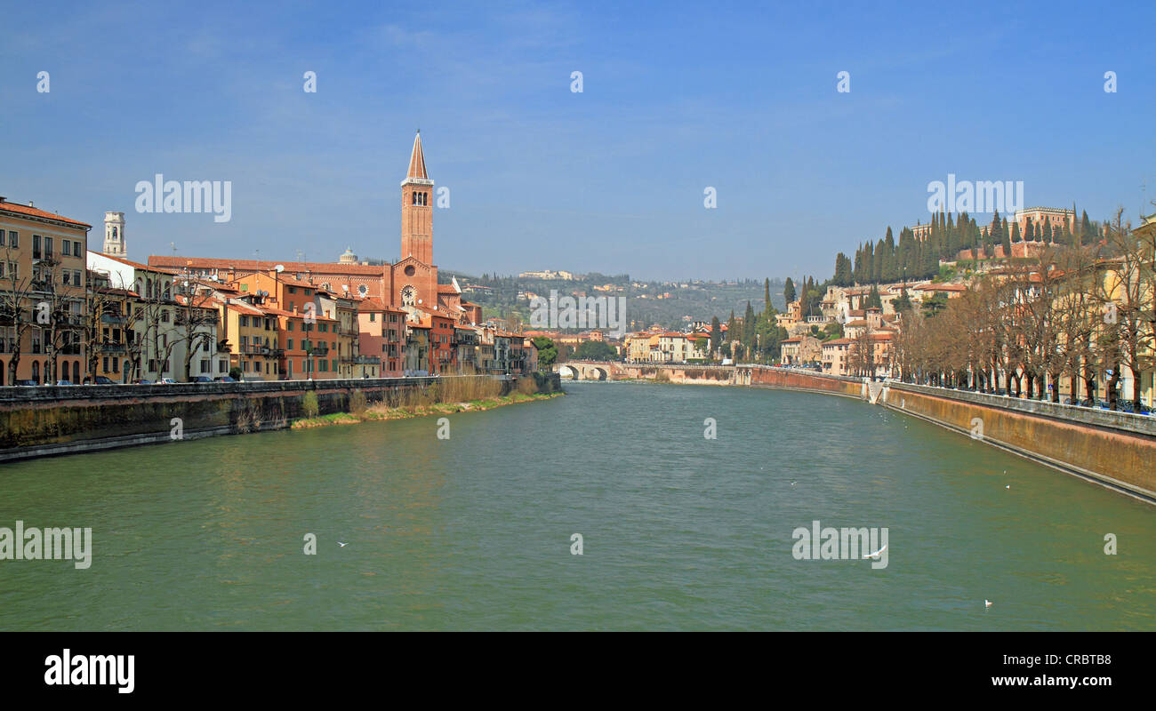 Adige River as seen from Ponte Nuovo bridge with the Church of Sant'Anastasia and the hills of San Pietro, Verona, Veneto region Stock Photo