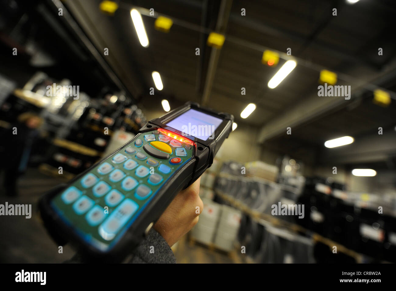 Scanner in an industrial warehouse Stock Photo Alamy