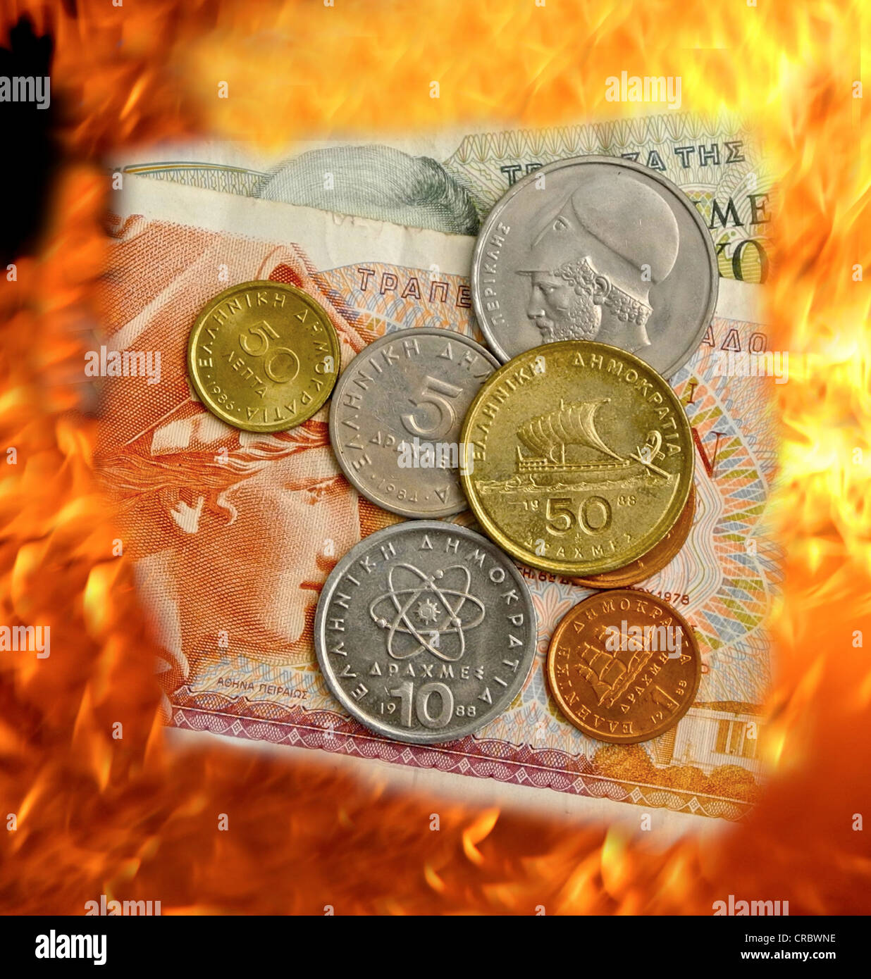 Drachma burning in flames Greek currency Stock Photo
