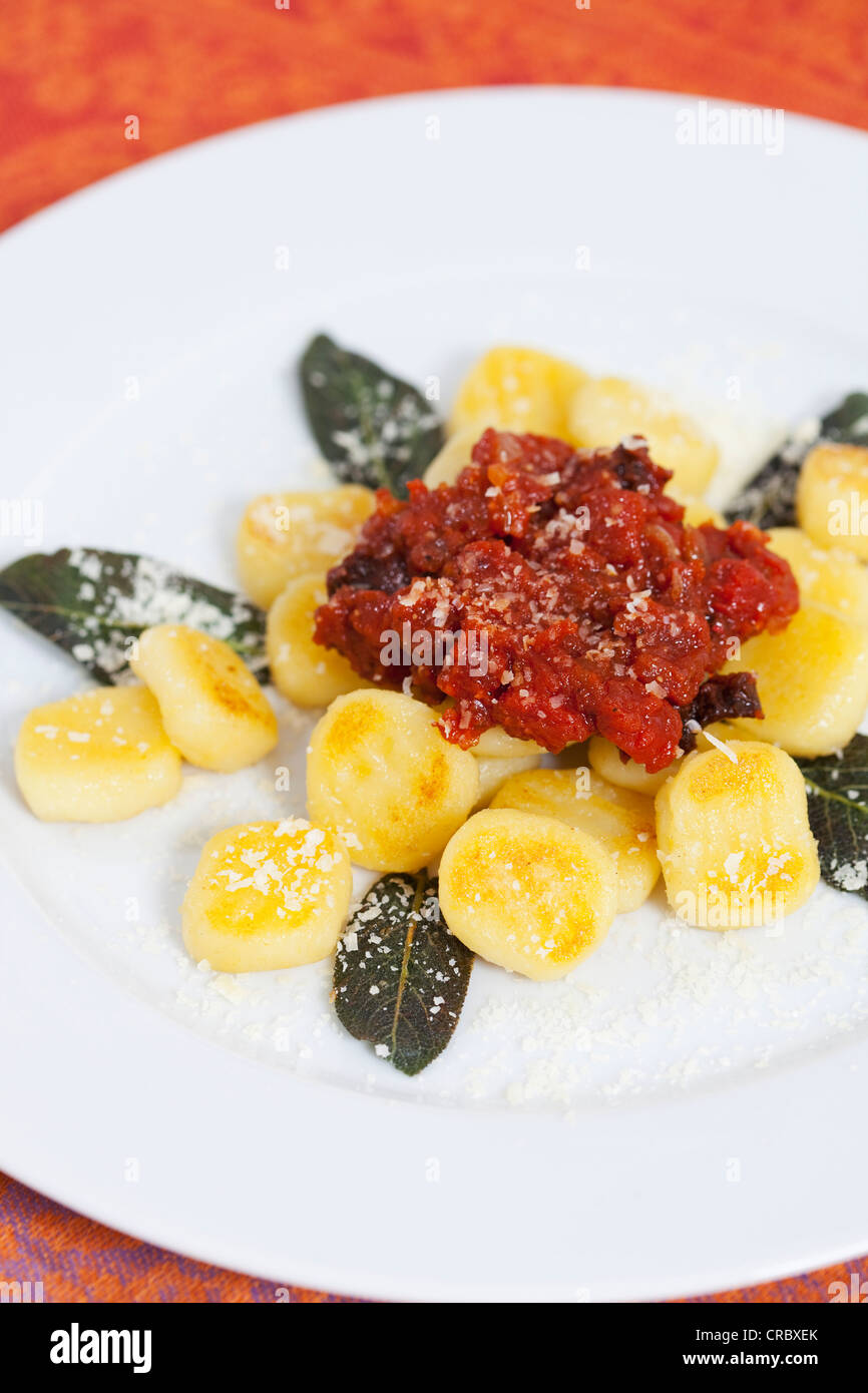 Bolognese sauce over gnocchi Stock Photo Alamy