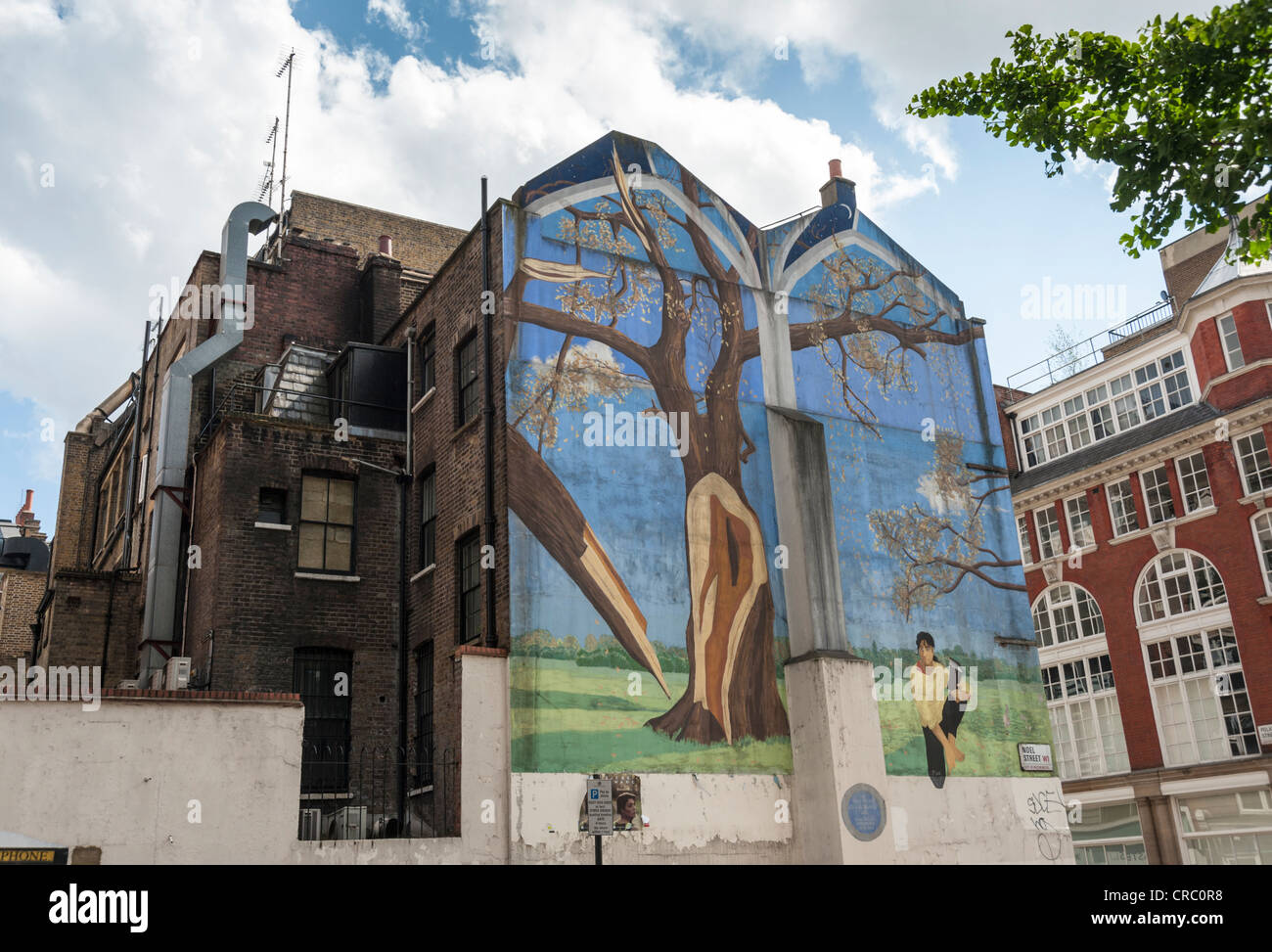 Mural or painting on side of houses at Noel Street London UK Stock