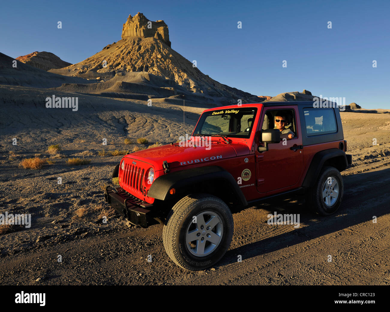 Jeep Rubicon Red Badlands Eroded Coloured Rocks Along The Smoky Mountain Road To Alstrom Point Bigwater Glen Canyon Stock Photo Alamy